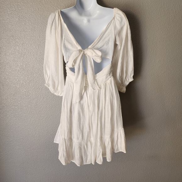 Saints + Secrets Puff Sleeve Open Back Bow White Ruffle Dress - Picture 4 of 9